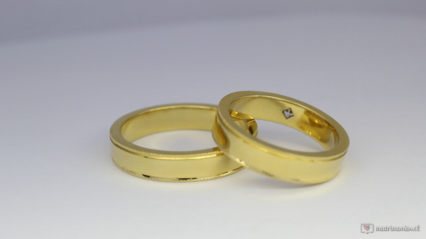 Argollas de matrimonio oro amarillo y diamante princess