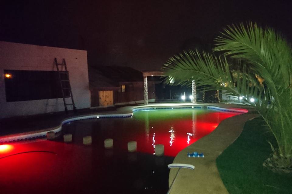 Vista nocturna piscina