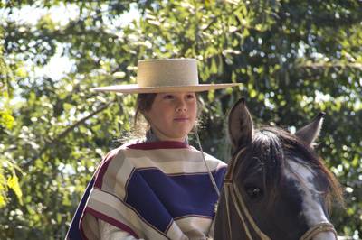 La niña en el caballo