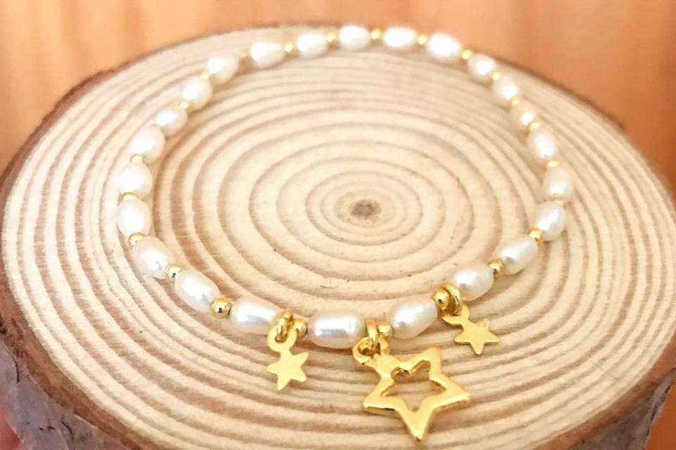 Pulsera perlas y dijes 14k