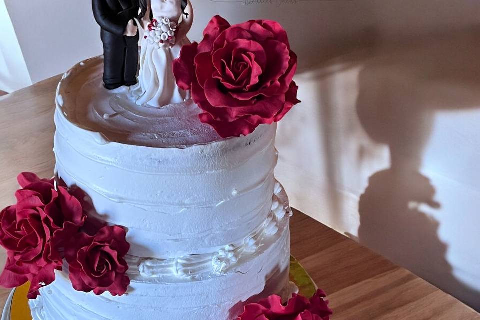 Rosas y novios de azúcar