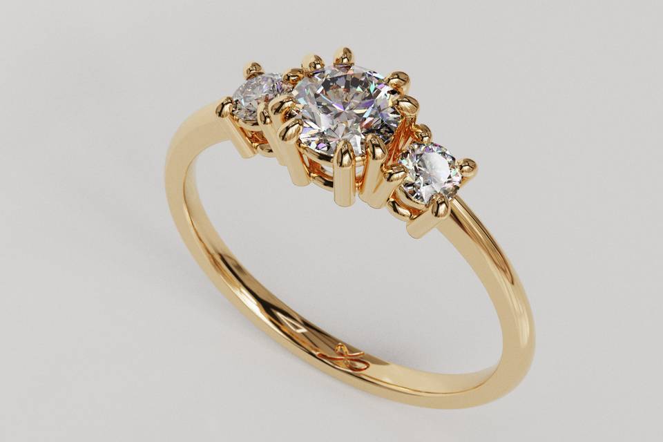 Anillo tresillo 18K